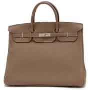 Pre-owned Leather handbags Hermès Vintage , Brown , Dames