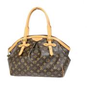 Pre-owned Metal handbags Louis Vuitton Vintage , Brown , Dames