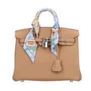 Pre-owned Leather handbags Hermès Vintage , Beige , Dames