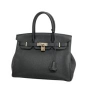 Pre-owned Leather handbags Hermès Vintage , Black , Dames