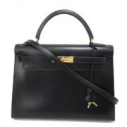 Pre-owned Leather handbags Hermès Vintage , Black , Dames