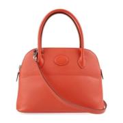 Pre-owned Leather handbags Hermès Vintage , Orange , Dames