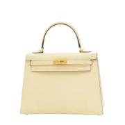 Pre-owned Leather handbags Hermès Vintage , Beige , Dames