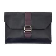 Pre-owned Leather clutches Hermès Vintage , Black , Dames