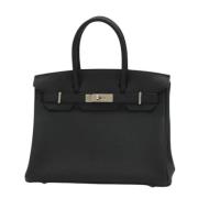 Pre-owned Leather handbags Hermès Vintage , Black , Dames