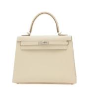 Pre-owned Leather handbags Hermès Vintage , Beige , Dames