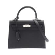 Pre-owned Leather handbags Hermès Vintage , Black , Dames