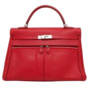 Pre-owned Leather handbags Hermès Vintage , Red , Dames