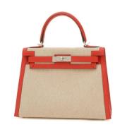 Pre-owned Canvas handbags Hermès Vintage , Beige , Dames