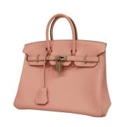 Pre-owned Leather handbags Hermès Vintage , Pink , Dames