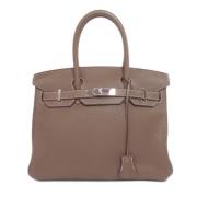 Pre-owned Leather handbags Hermès Vintage , Brown , Dames