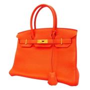 Pre-owned Leather handbags Hermès Vintage , Orange , Dames