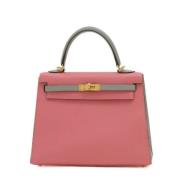 Pre-owned Leather handbags Hermès Vintage , Pink , Dames