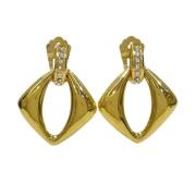 Pre-owned Metal earrings Yves Saint Laurent Vintage , Yellow , Dames