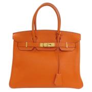 Pre-owned Leather handbags Hermès Vintage , Orange , Dames