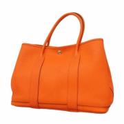 Pre-owned Leather handbags Hermès Vintage , Orange , Dames