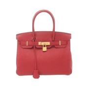 Pre-owned Leather handbags Hermès Vintage , Red , Dames