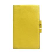 Pre-owned Leather wallets Hermès Vintage , Yellow , Dames