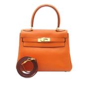 Pre-owned Leather handbags Hermès Vintage , Orange , Dames