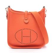 Pre-owned Leather shoulder-bags Hermès Vintage , Orange , Dames