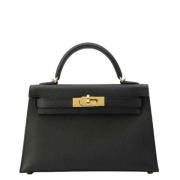 Pre-owned Leather handbags Hermès Vintage , Black , Dames