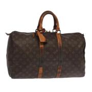 Pre-owned Canvas travel-bags Louis Vuitton Vintage , Brown , Dames