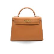 Pre-owned Fabric handbags Hermès Vintage , Brown , Dames