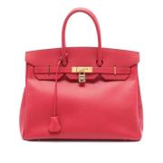 Pre-owned Leather handbags Hermès Vintage , Red , Dames