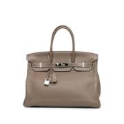 Pre-owned Leather handbags Hermès Vintage , Brown , Dames