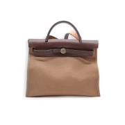 Pre-owned Leather handbags Hermès Vintage , Brown , Dames