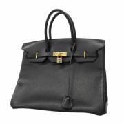 Pre-owned Leather handbags Hermès Vintage , Black , Dames