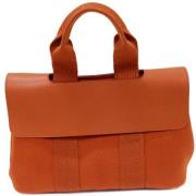 Pre-owned Leather handbags Hermès Vintage , Orange , Dames