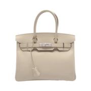 Pre-owned Fabric handbags Hermès Vintage , Beige , Dames