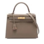 Pre-owned Leather handbags Hermès Vintage , Brown , Dames