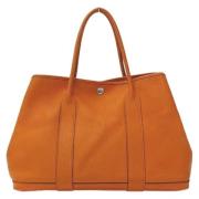 Pre-owned Leather handbags Hermès Vintage , Orange , Dames