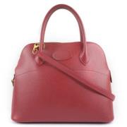 Pre-owned Leather handbags Hermès Vintage , Red , Dames