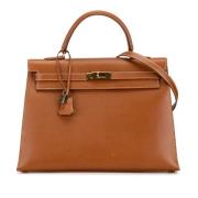 Pre-owned Leather handbags Hermès Vintage , Brown , Dames