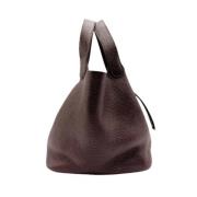 Pre-owned Leather handbags Hermès Vintage , Brown , Dames