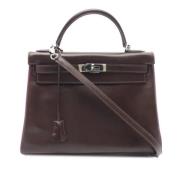 Pre-owned Leather handbags Hermès Vintage , Brown , Dames