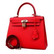 Pre-owned Leather handbags Hermès Vintage , Red , Dames