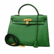 Pre-owned Leather handbags Hermès Vintage , Green , Dames