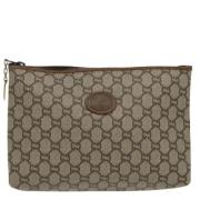 Pre-owned Canvas clutches Gucci Vintage , Beige , Dames