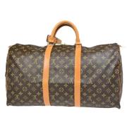 Pre-owned Canvas handbags Louis Vuitton Vintage , Brown , Unisex