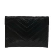 Pre-owned Leather clutches Yves Saint Laurent Vintage , Black , Dames