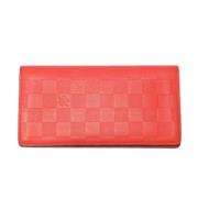 Pre-owned Canvas wallets Louis Vuitton Vintage , Orange , Dames