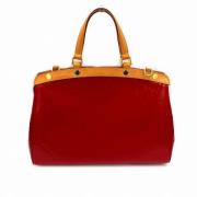 Pre-owned Leather handbags Louis Vuitton Vintage , Red , Dames