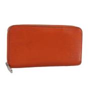 Pre-owned Leather wallets Louis Vuitton Vintage , Orange , Dames