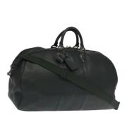 Pre-owned Leather travel-bags Louis Vuitton Vintage , Green , Dames