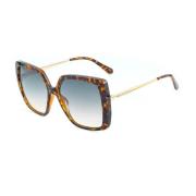 Stijlvolle Metalen Zonnebril met Degraded Lenzen Guess , Brown , Dames