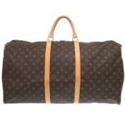 Pre-owned Canvas travel-bags Louis Vuitton Vintage , Brown , Dames